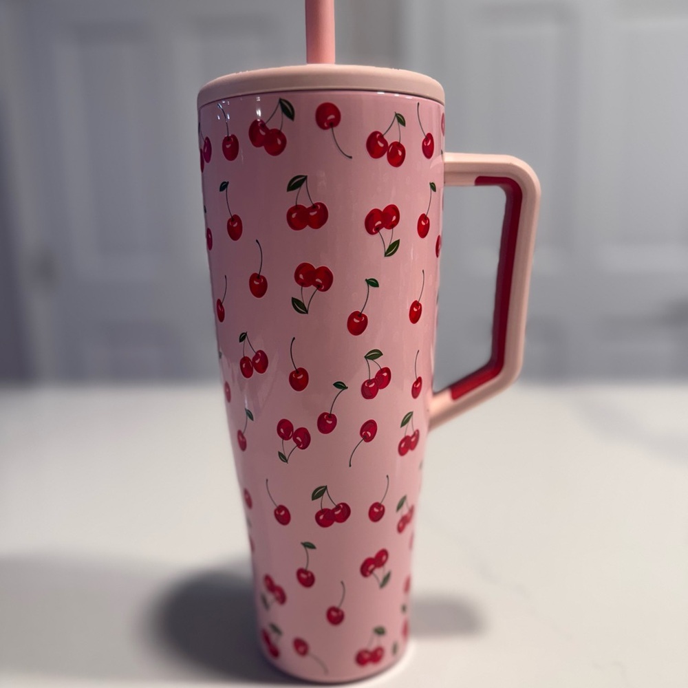 BrüMate Era 40 oz. straw tumbler in the Cherry Edition colorway.